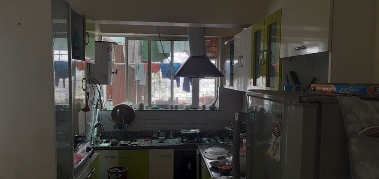 Kitchen, gera-park-view 2 Bedroom 1030 Sq.Ft. Apartment In Kharadi Pune 10589112