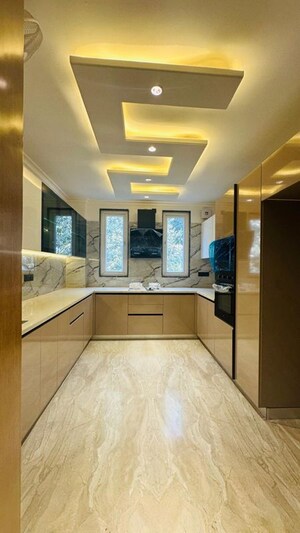 Kitchen in 4 BHK Builder Floor at Suncity Heights, Sector 54 – for Rent