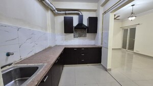 Kitchen in 2 BHK Apartment at Godrej Palm Retreat, Sector 150 – for Sale