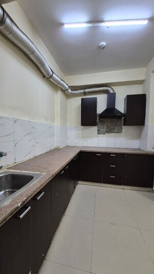 Kitchen in 2 BHK Apartment at Godrej Palm Retreat, Sector 150 – for Sale