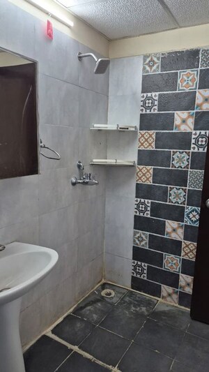 Bathroom in 2 BHK Apartment at Godrej Palm Retreat, Sector 150 – for Sale