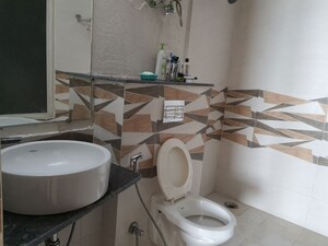 Bathroom in 3 BHK Apartment at Gaur Sportswood, Sector 79 – for Rent