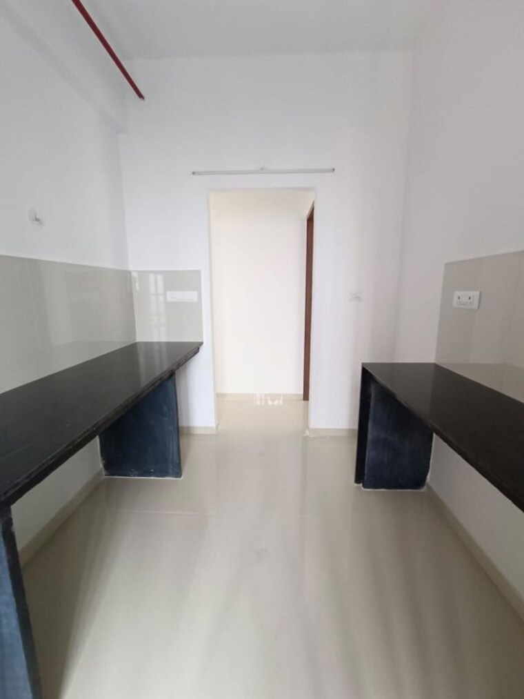 Kitchen, runwal-the-central-park 3 Bedroom 1200 Sq.Ft. Apartment In Chinchwad Pune 10589174