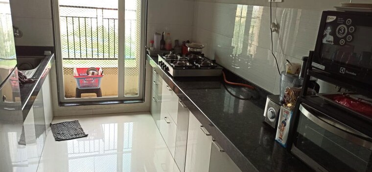 Kitchen, rustomjee-urbania-azziano 2 Bedroom 850 Sq.Ft. Apartment In Thane West Thane 10589190