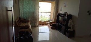 Living Room in 2 BHK Apartment at Rustomjee Urbania Azziano, Thane West – for Sale