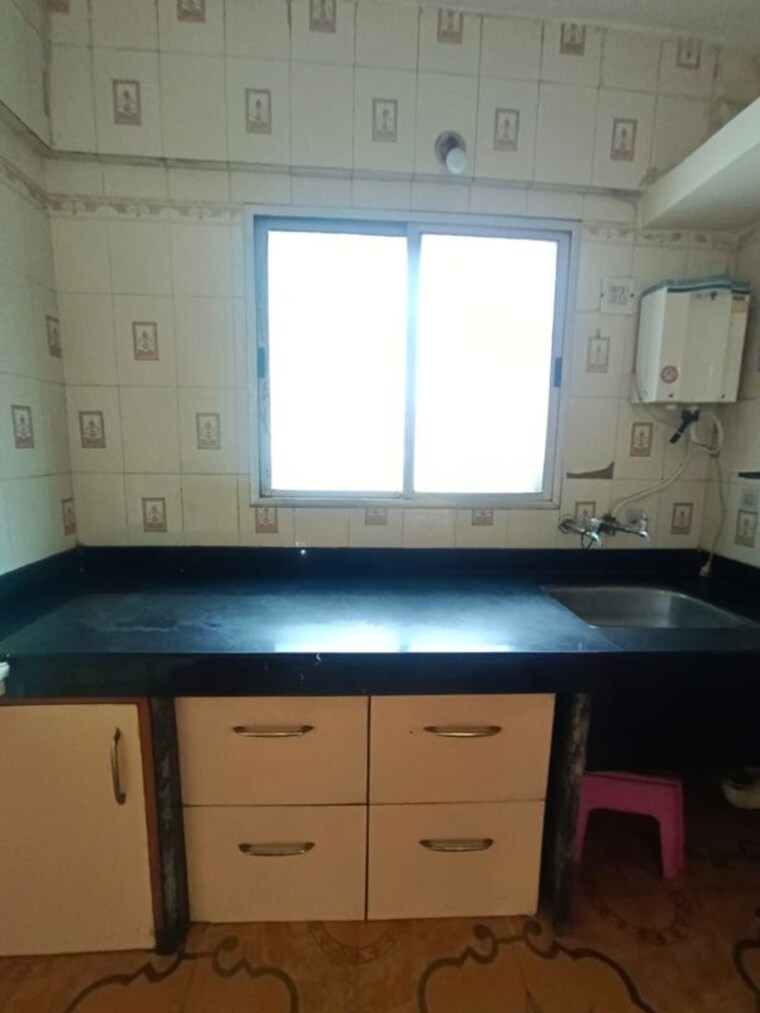 Kitchen, kute-vrundavan-society 2 Bedroom 1200 Sq.Ft. Apartment In Akurdi Pune 10589202