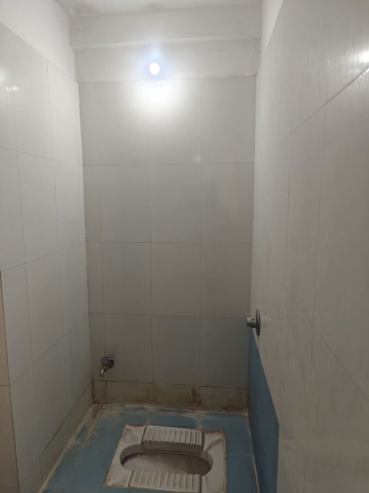 Bathroom, blue-skky-olive 2 Bedroom 635 Sq.Ft. Apartment In Wagholi Pune 10589277