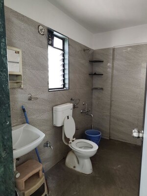 Bathroom in 2 BHK Apartment at Gangapur Road – for Sale