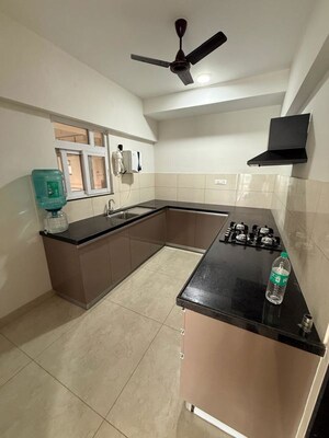 Kitchen in 3.5 BHK Apartment at Gera Song Of Joy, Kharadi – for Rent
