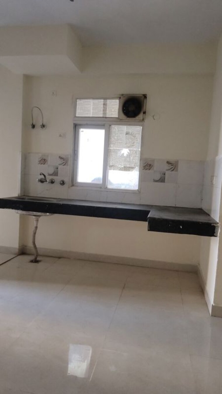 Kitchen, signature-global-the-roselia 2 Bedroom 569 Sq.Ft. Apartment In Sector 95a Gurgaon 10589263