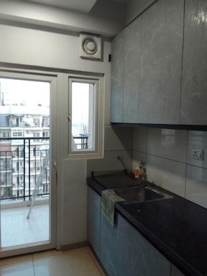 Kitchen in 3 BHK Apartment at Saviour Green Arch, Tech Zone 4 Greater Noida – for Sale