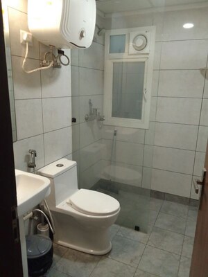 Bathroom in 3 BHK Apartment at Saviour Green Arch, Tech Zone 4 Greater Noida – for Sale