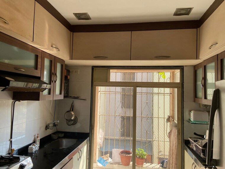 Kitchen, geetanjali-chsl 3 Bedroom 920 Sq.Ft. Apartment In Bandra East Mumbai 10589362