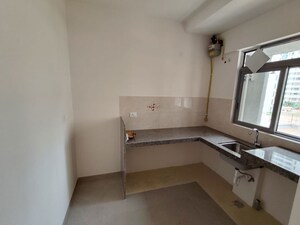 Kitchen in 1 BHK Apartment at Piramal Vaikunth, Balkum Pada – for Rent
