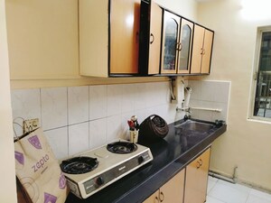 Kitchen in 1 BHK Apartment at Happy Valley, Manpada – for Rent