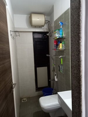 Bathroom in 1 BHK Apartment at Kanakia Rainforest, Andheri East – for Rent