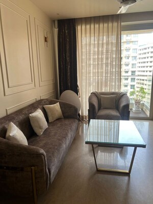 Living Room in 2 BHK Apartment at Castle Rock, Powai – for Sale