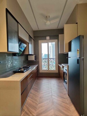 Kitchen in 2 BHK Apartment at Paradigm Green Acrres, Bandra West – for Rent