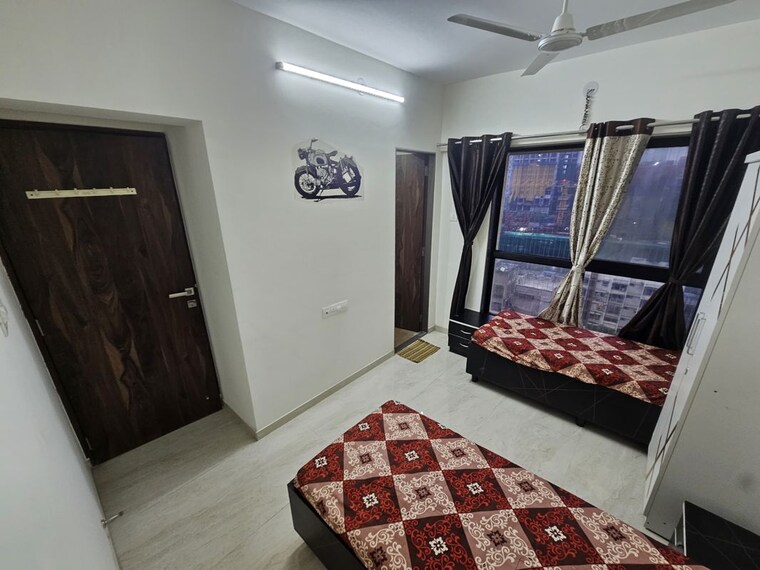 Bedroom, kandivali east Pg For Boys & Girls In Kandivali East 10589481