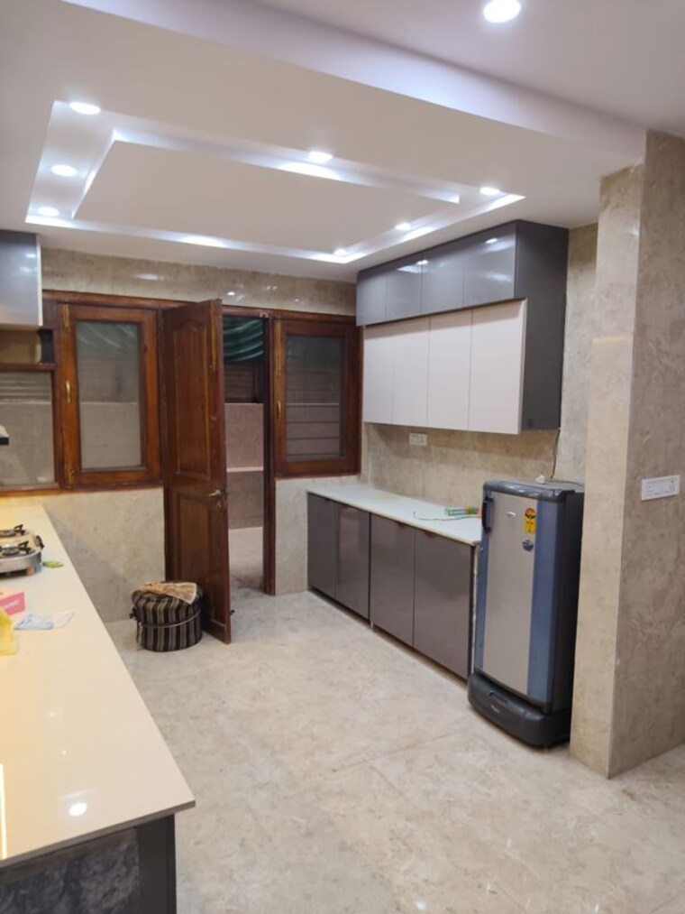 Kitchen, sector 23 6+ Bedroom 300 Sq.Mt. Independent House In Sector 23 Noida 10589533