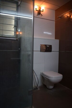 Bathroom in 4 BHK Apartment at Kolte Patil 24K Glitterati, Pimple Nilakh – for Rent