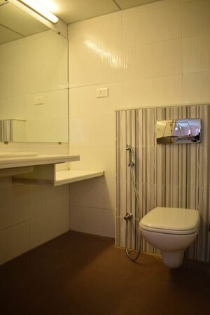 Bathroom in 4 BHK Apartment at Kolte Patil 24K Glitterati, Pimple Nilakh – for Rent