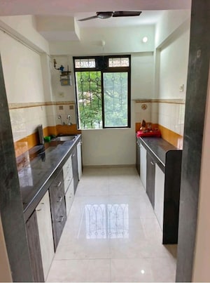 Kitchen in 2 BHK Apartment at Lodha Paradise, Majiwada – for Sale