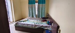 Bedroom in 2 BHK Apartment at Vasalya Vihar, Aundh – for Rent