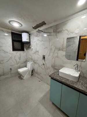 Bathroom in 2 BHK Builder Floor at Chattarpur – for Rent
