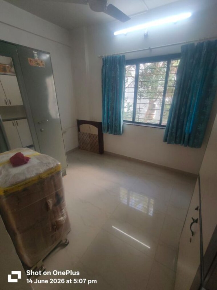 Living Room, woodland-avenue 2 Bedroom 1105 Sq.Ft. Apartment In Kothrud Pune 10589678