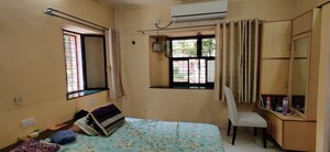 Bedroom in 3 BHK Apartment at Gananjay Society, Kothrud – for Rent
