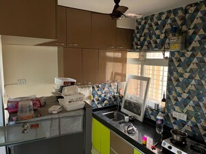 Kitchen in 1 BHK Apartment at Cosmos Orchid, Ghodbunder Road – for Rent