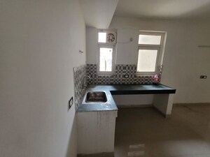 Kitchen in 2 BHK Apartment at Signature Orchard Avenue 2, Sector 93 – for Rent