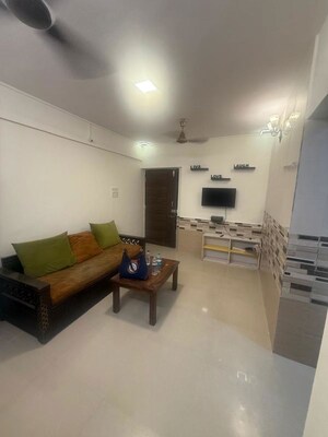 Living Room in 1 BHK Apartment at Dhamji Shamji Mahavir Spring Tulip Phase 1, Pokhran Road No Two – for Rent