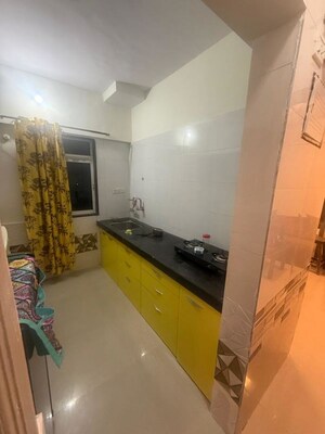 Kitchen in 1 BHK Apartment at Dhamji Shamji Mahavir Spring Tulip Phase 1, Pokhran Road No Two – for Rent