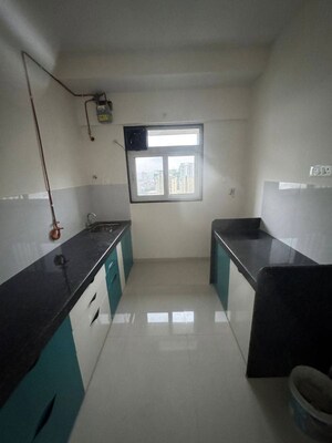Kitchen in 2 BHK Apartment at Ashar Axis, Majiwada – for Sale