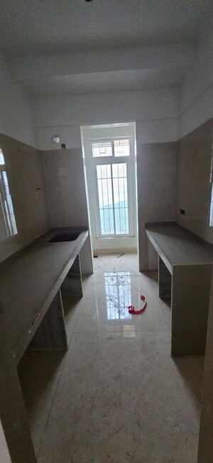 Kitchen in 1 BHK Apartment at Metropolis Rivera, Kasarvadavali – for Rent