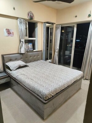 Bedroom in 1 BHK Apartment at Metropolis Bayside, Kasarvadavali – for Rent