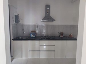 Kitchen in 2 BHK Apartment at Pride World City Wellington, Charholi Budruk – for Rent