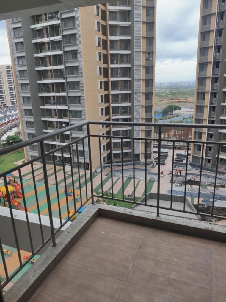 Balcony, pride-world-city-wellington 2 Bedroom 780 Sq.Ft. Apartment In Charholi Budruk Pune 10590012