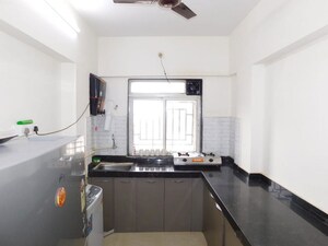 Kitchen in 2 BHK Apartment at Santacruz West – for Sale