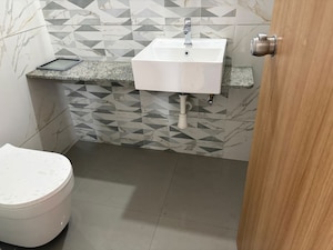 Bathroom in 3 BHK Apartment at Nivasa Enchante, Lohgaon – for Rent