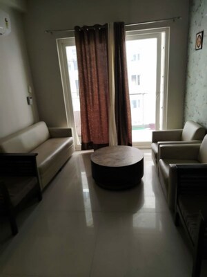 Living Room in 2 BHK Builder Floor at Homeland Global Park CP Atelier, Industrial Area – for Rent
