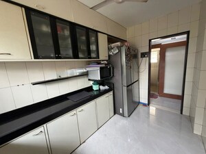 Kitchen in 2 BHK Apartment at Tata Colony – for Sale