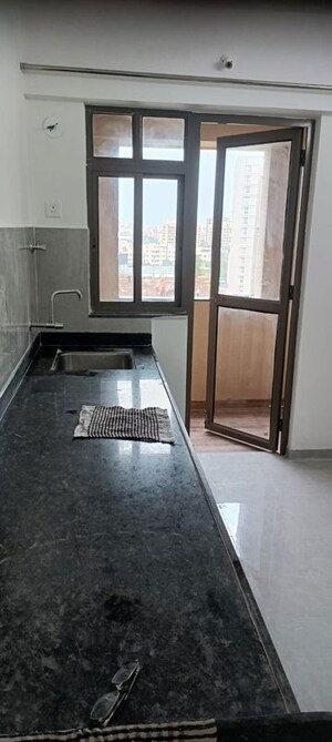 Kitchen in 3 BHK Apartment at Ganga New town, Dhanori – for Rent
