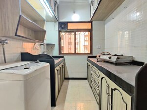 Kitchen in 1 BHK Apartment at Palm Acre Apartments, Santacruz East – for Rent
