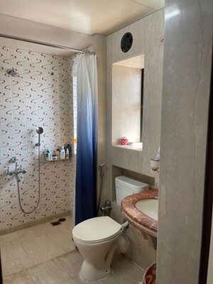 Bathroom in 1 BHK Apartment at Ajmera Bhakti Park, Bhakti Park – for Rent
