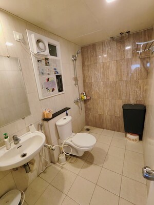 Bathroom in 2.5 BHK Apartment at Mantri Webcity, Hennur Road – for Rent