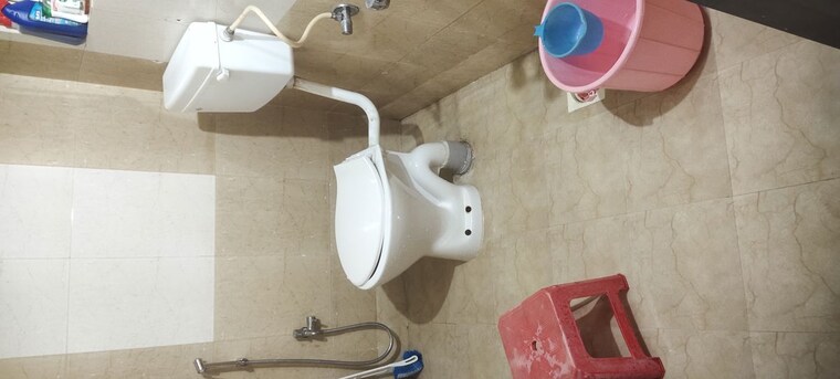 Bathroom, nisarg-renuka-akruti 2 Bedroom 900 Sq.Ft. Apartment In Wakad Pune 10590231
