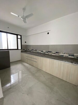 Kitchen in 3 BHK Apartment at Unique Youtopia, Kharadi – for Rent